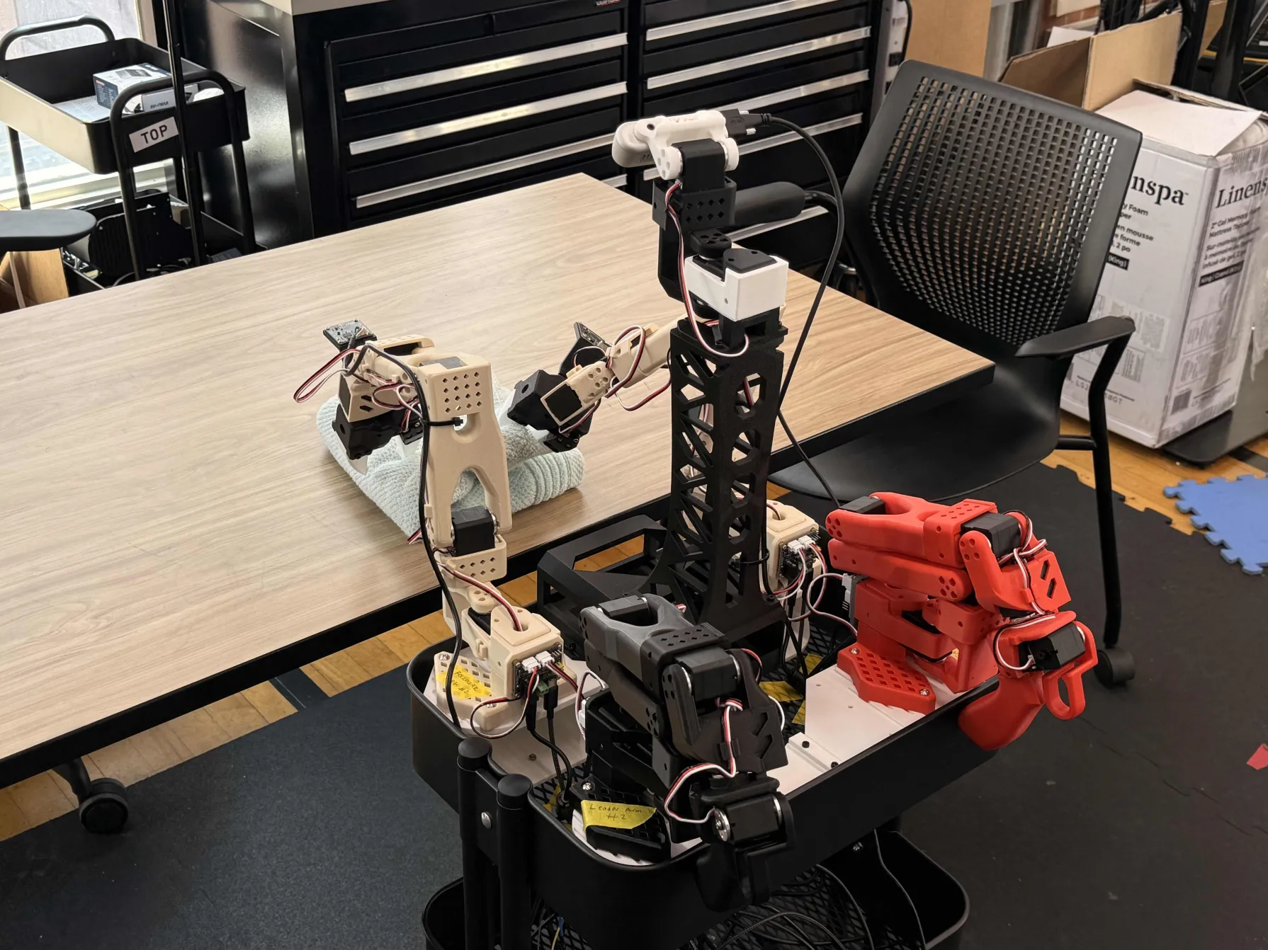 XLE Robot Arm — Clothes-Folding Training Rig